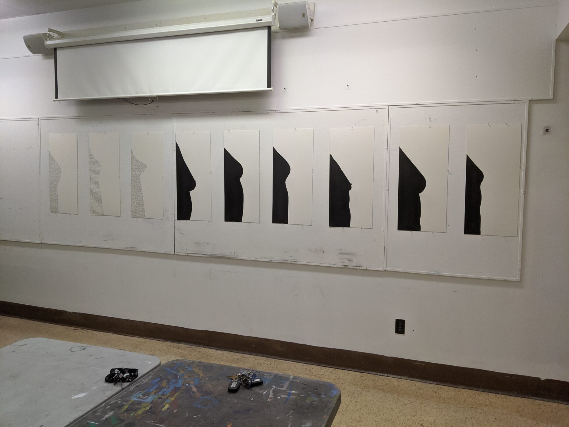 An image of 9 paintings of silhouettes of bodies with breasts. 6 of the images are silhouettes of actual bodies and 3 are silhouettes of idealized bodies from different eras. The bodies are all quite small and at a distance from the viewer.